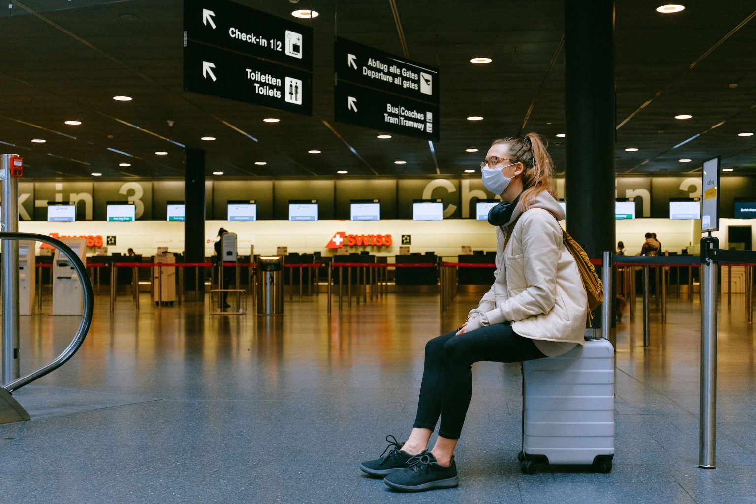 Woman wearing mask in Airport