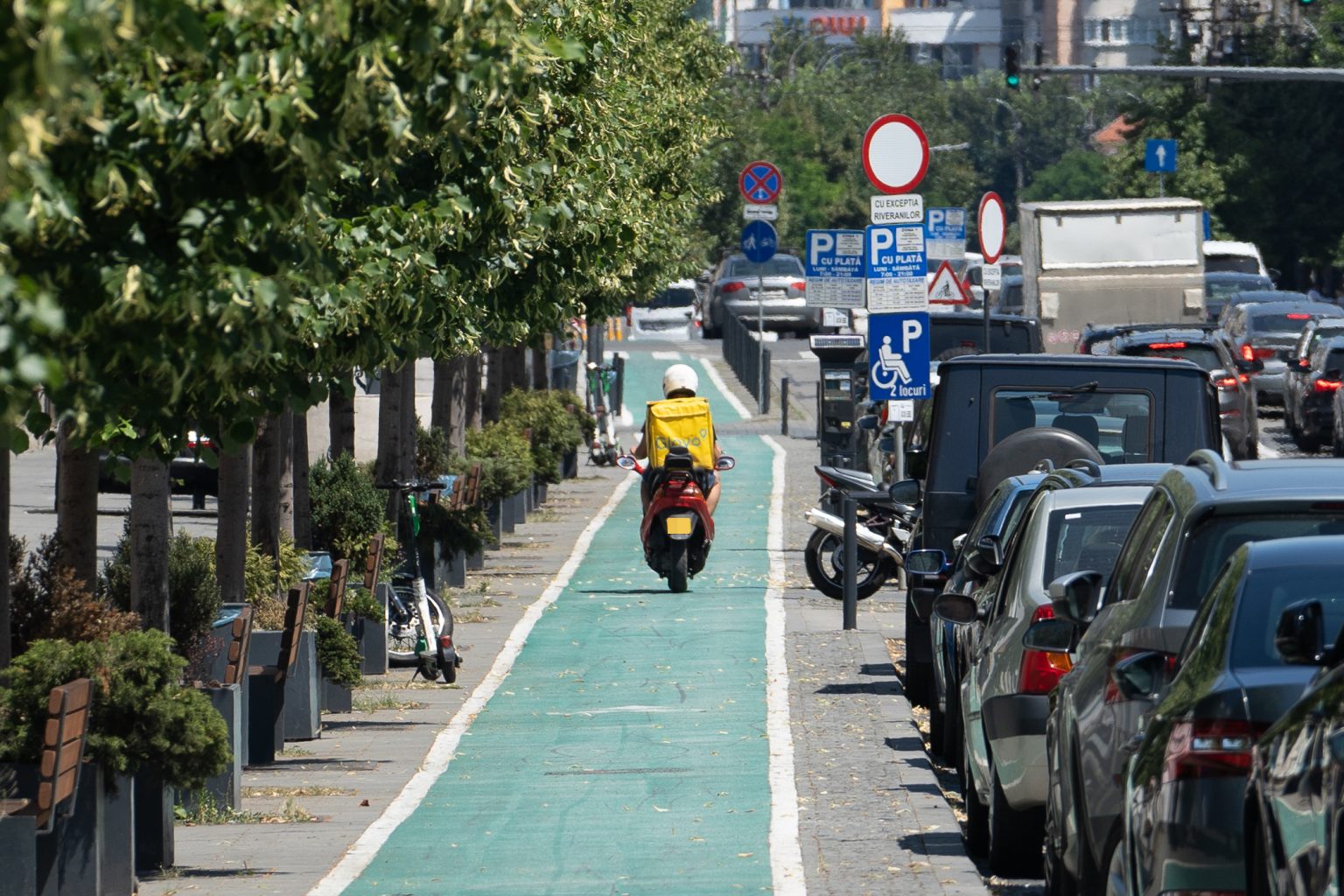 Moped Driving Down Cycle Path in Cluj-Napoca