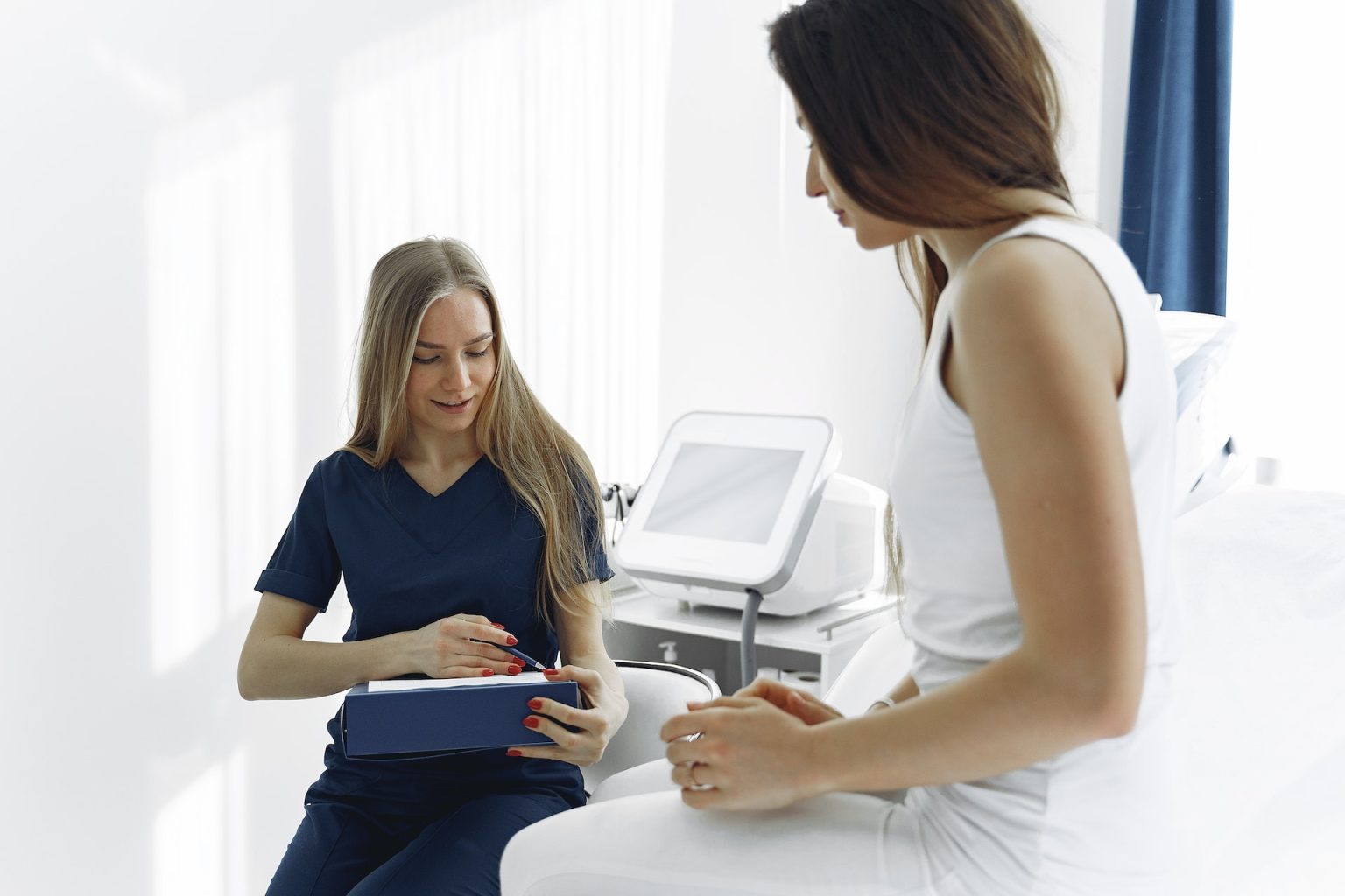 Female Nurse with Patient